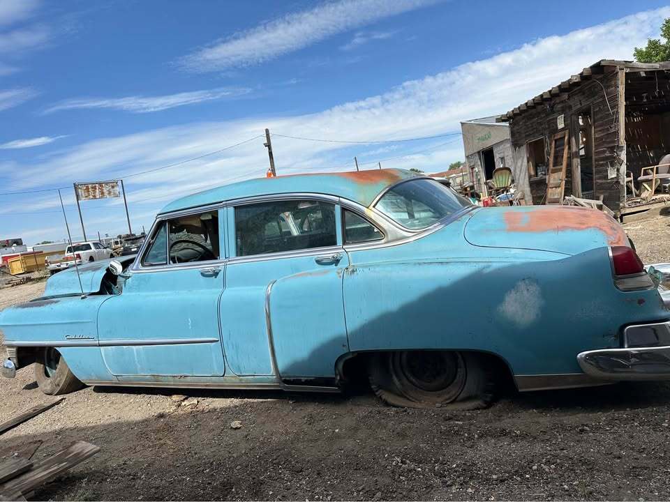 The Cadillac at Pueblo junkyard - day of purchase